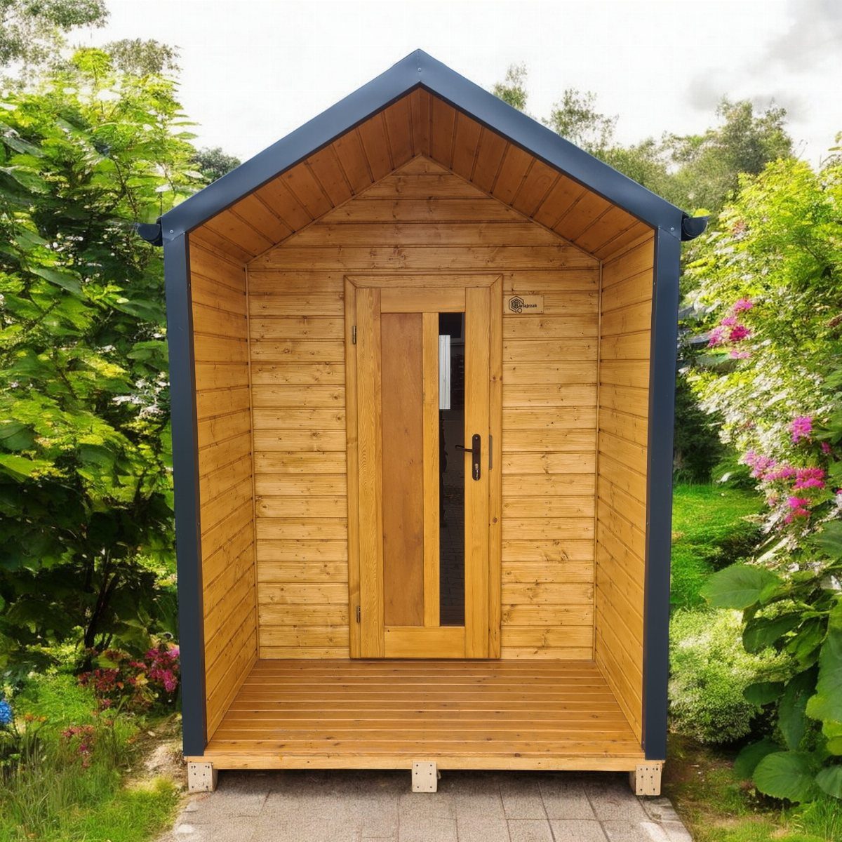 Cottage Garden Sheds with Porch: 13 Layouts and Looks 13 Wooden garden shed with a small porch and dark grey trim nestled in a green garden.