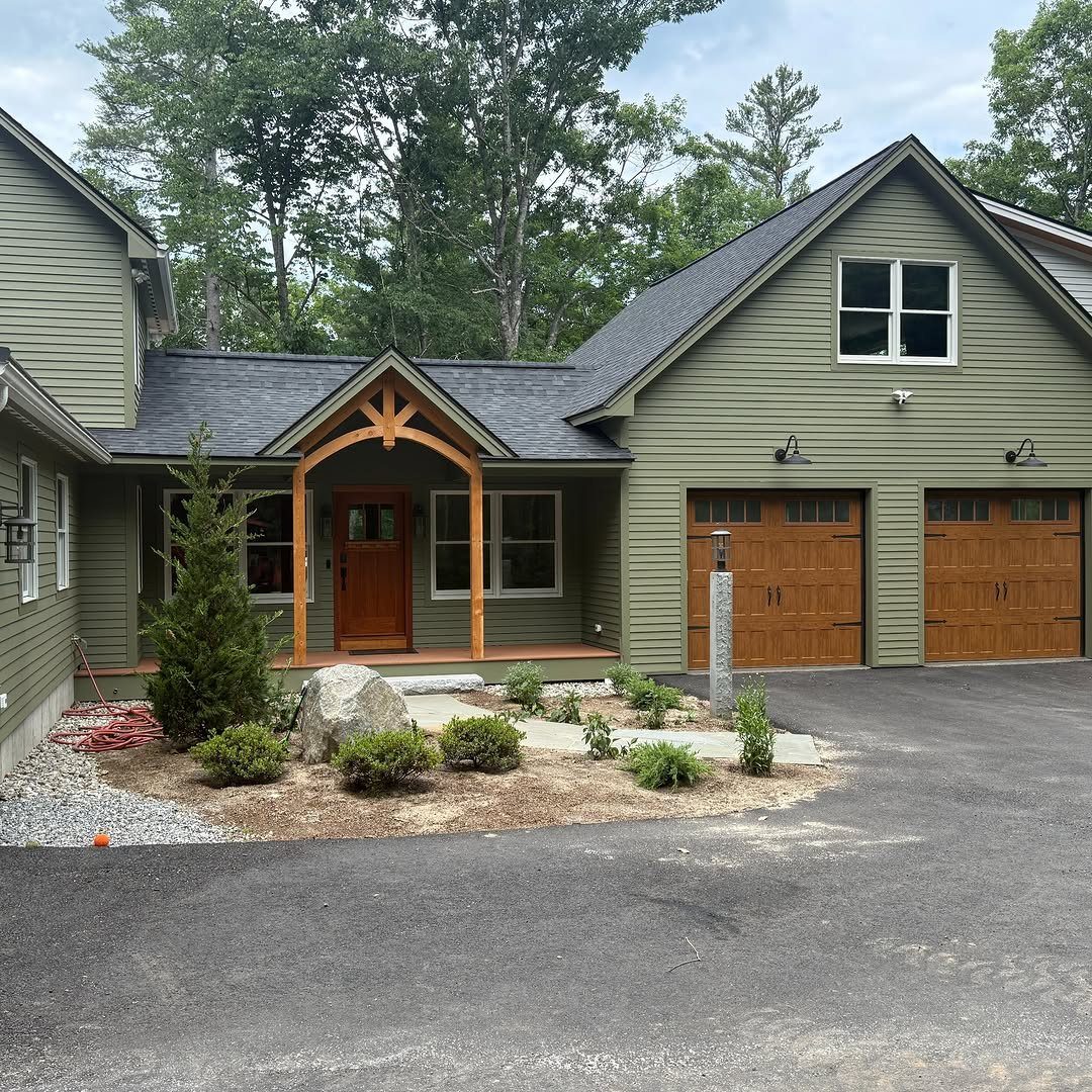 Detached Garage with Breezeway to House: 8 Ideas 7 Olive green detached garage with wooden doors connected to a house via a covered breezeway.